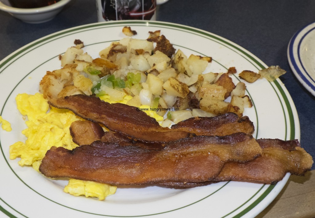 Bacon, eggs, and country potatoes.