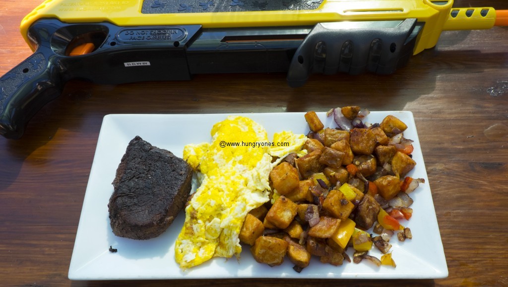 Steak, eggs, country potatoes.  Salt gun in the back.